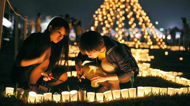 japan_tsunami_reember_AP_Kyodo